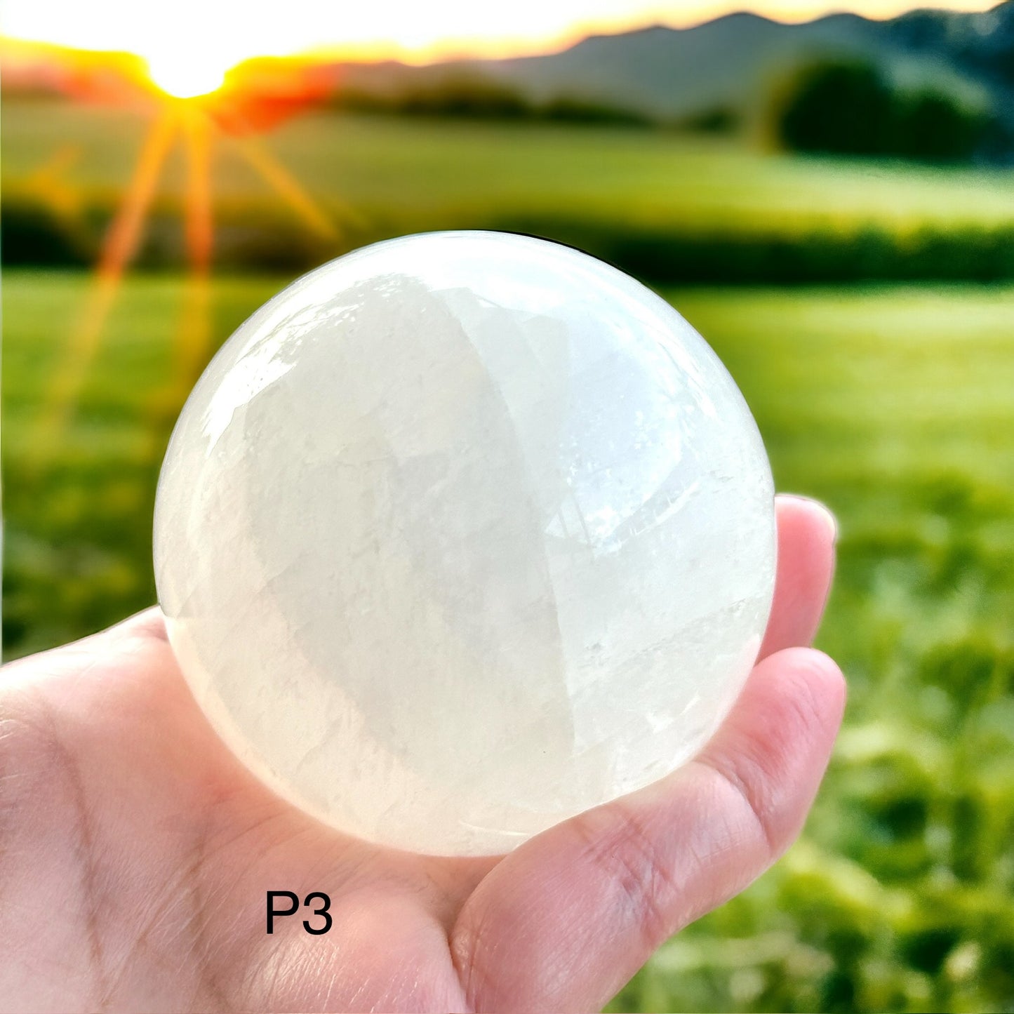 White Calcite Sphere (Mexico) with wooden stand (55mm)