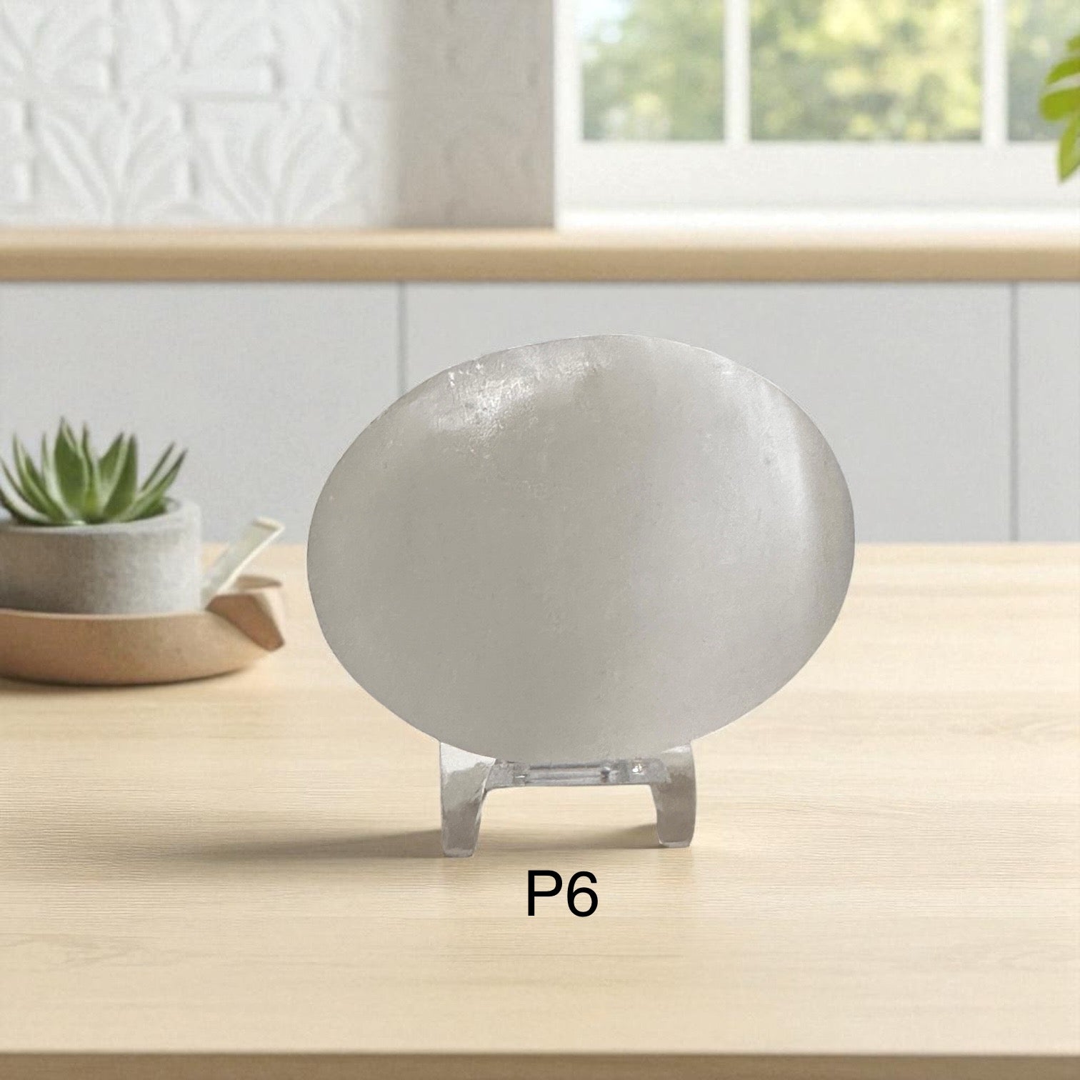 Selenite Palm Stone with stand 50mm