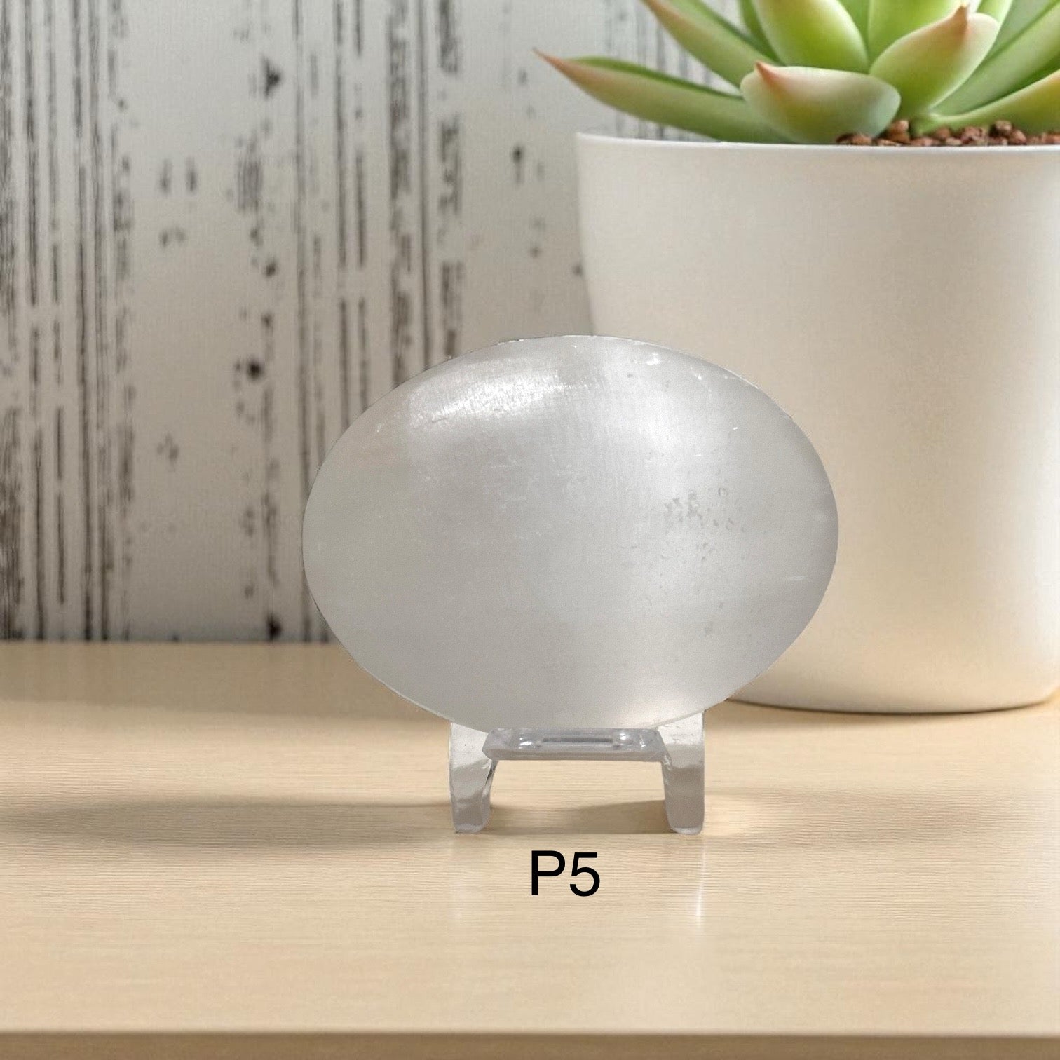 Selenite Palm Stone with stand 50mm