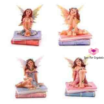 Flower Fairy Sitting On Books