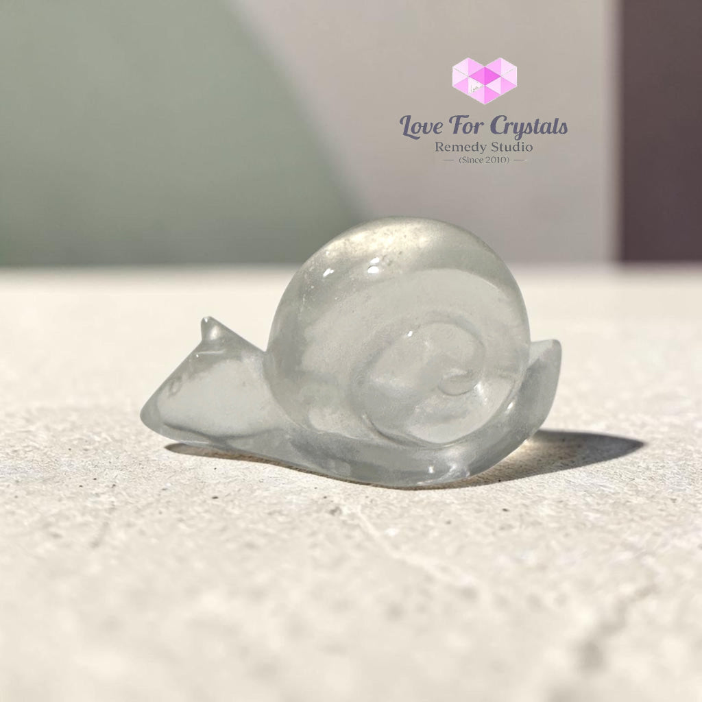Natural Clear Quartz Snail Carving - 94g 70mm - Clear quartz