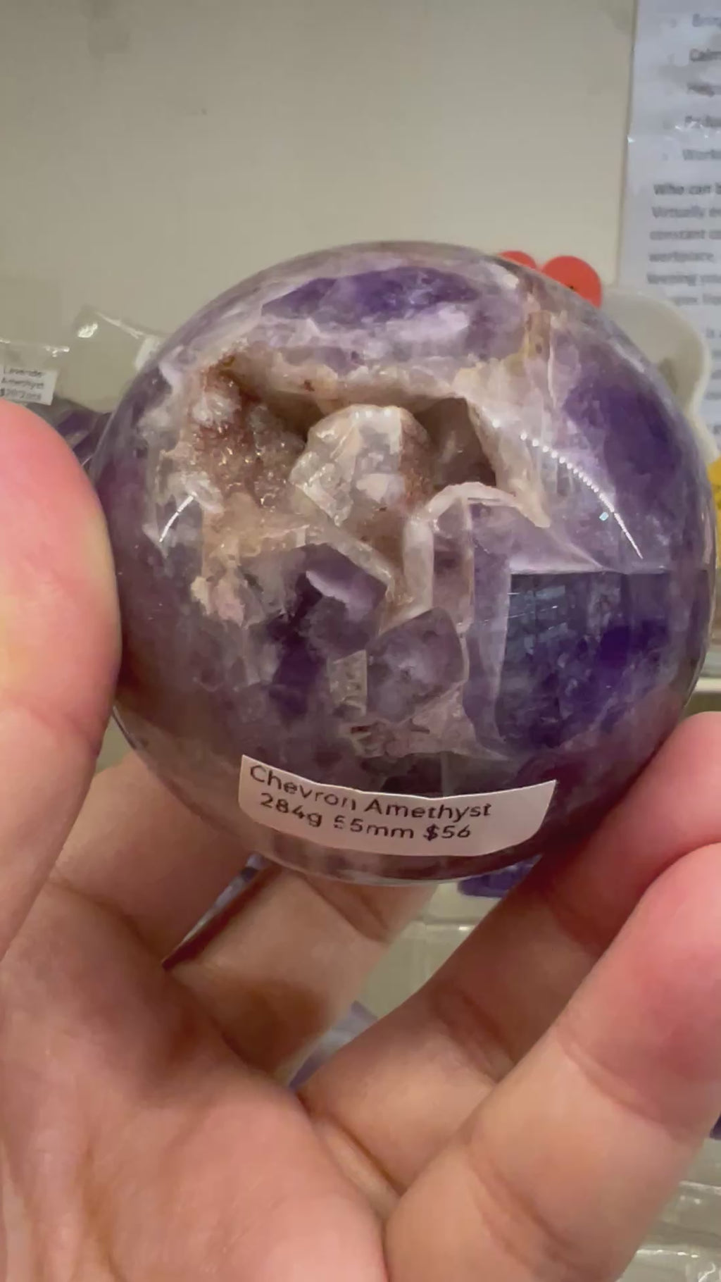 Chevron Amethyst Sphere (Brazil) with wooden stand