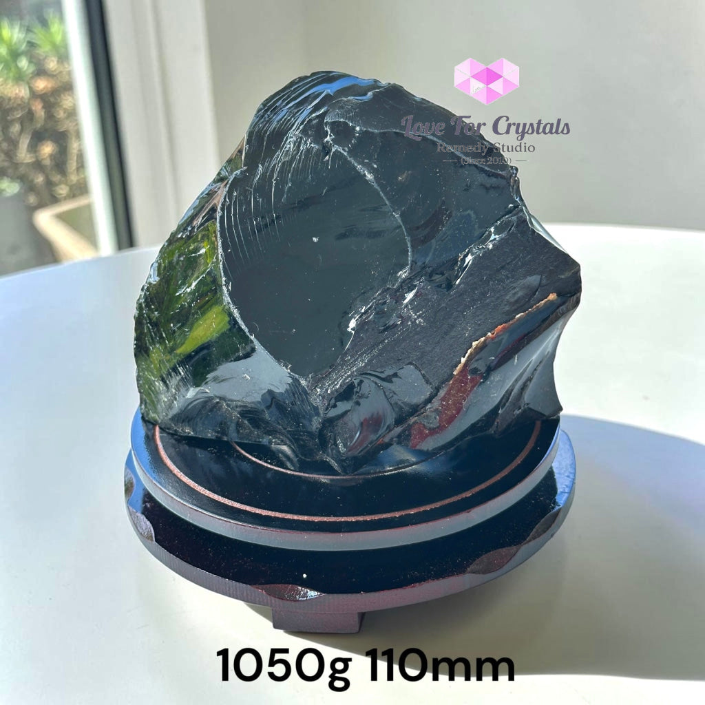 Raw Black Obsidian on Rotating Wooden Base (Protection) - 1050g 110mm