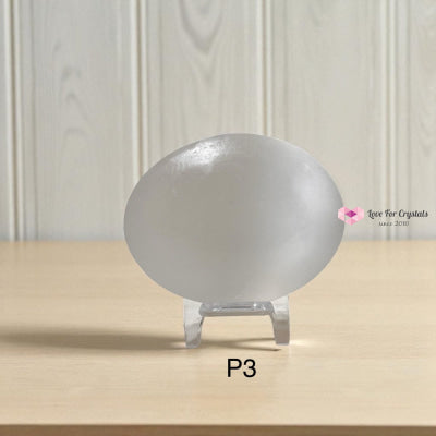 Selenite Palm Stone with stand 50mm Photo 3 Selenite