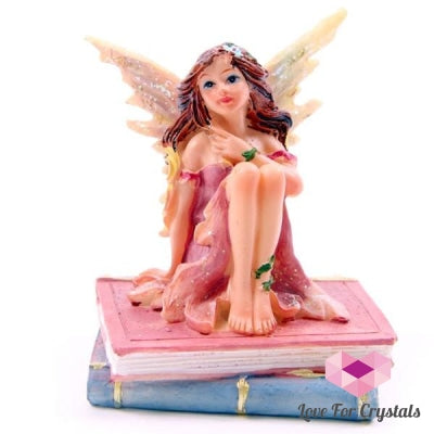 Flower Fairy Sitting On Books